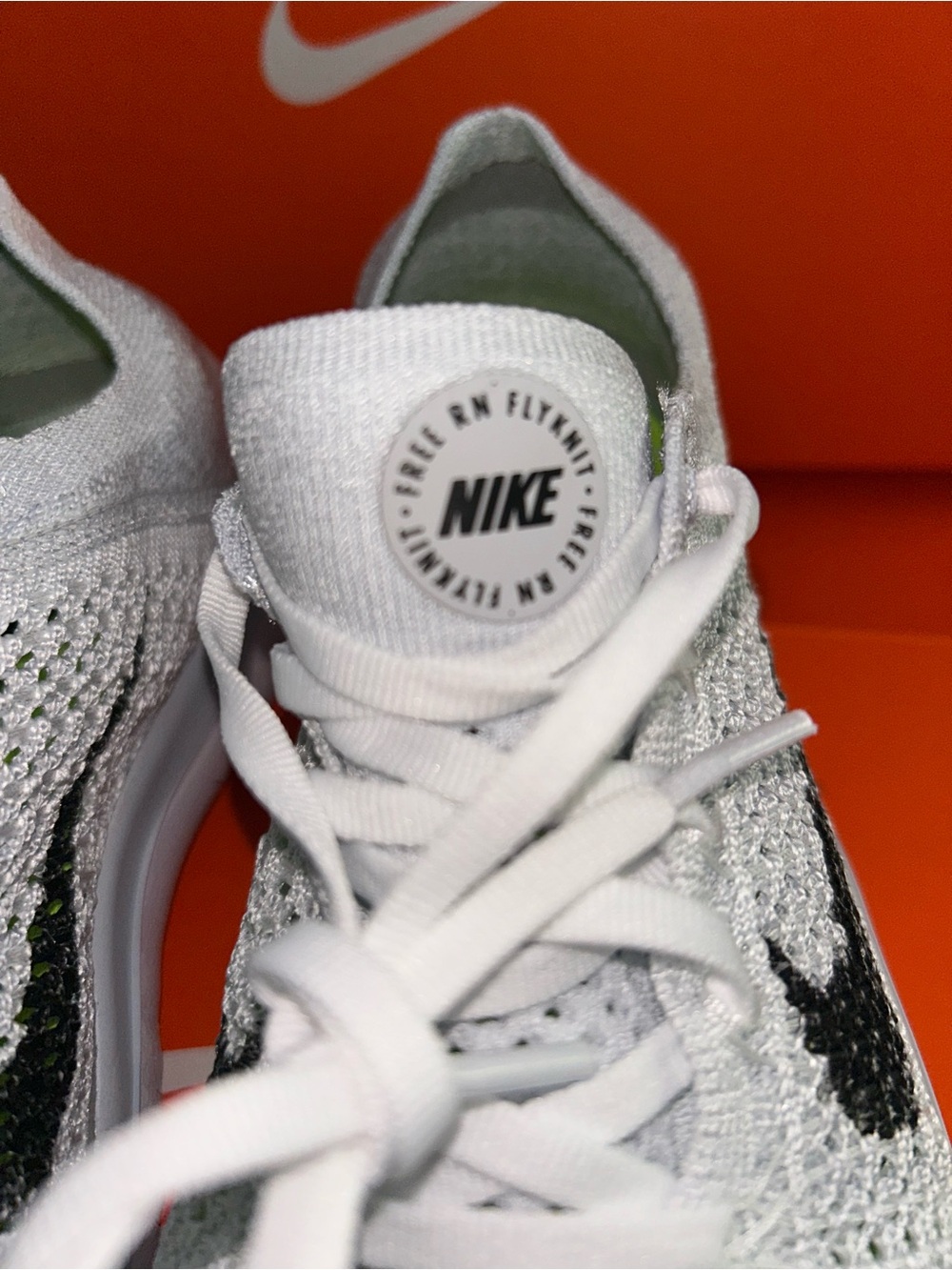 Nike White Flyknit Sneakers with Black and white Swoosh - Picture 6 of 8